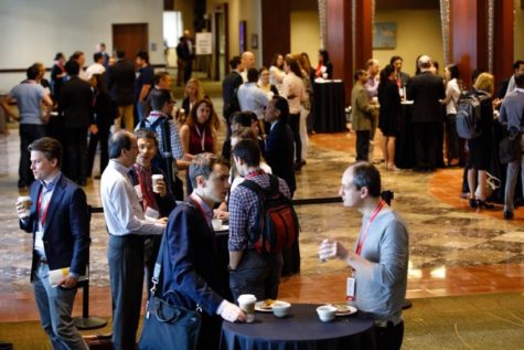 Attendees talk during the Early Career Sessions at ATVB17