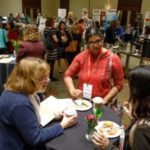Attendees use the networking opportunities during the breakfast and registration at ATVB 2017