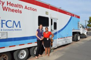 Elizabeth teaches health professions students at the Mobile Health Program's clinic on wheels, where she practices as a family nurse practitioner